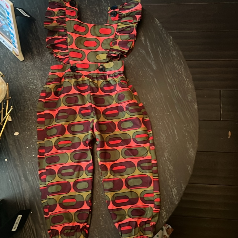 Beautiful 12 month jumpsuit .